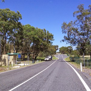 The loop road with the through lane and parking on each side.