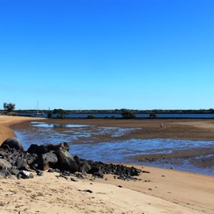 Beach and training wall at Burnett Heads