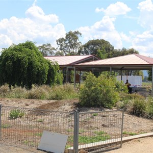 A sheltered area wit barbecues