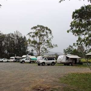 RVs parked along the river bank