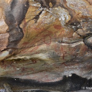 The art site is under the large ledge of this sandstone overhang