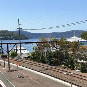 View over the northbound railway tracks to Dangar Island
