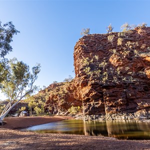 Small camp area alongside the pool