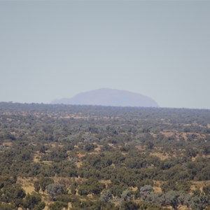 Ayers Rock as seen from top of Longs Range - 110 km distant