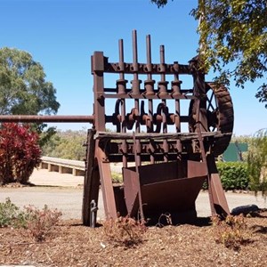 Gold stamping mill. River and bridge in the background.