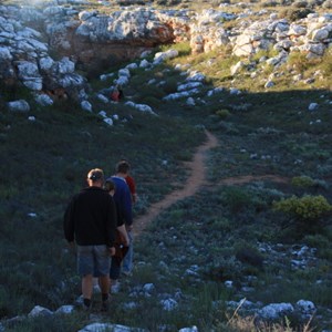 Walkers entering Knowles Cave area