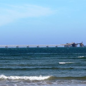 Iron ore loading equipment at the shipping end of the wharf 