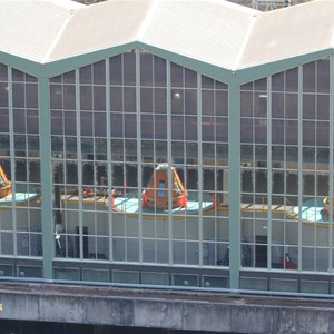 Exciters in orange on top of generators