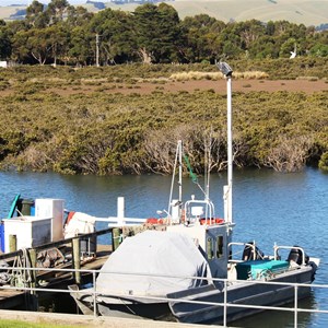 Boats moored in the river