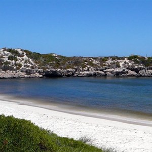 Dyamite Bay looking SW. Note the sheltered waters contrasting with the wind swept waters beyond.