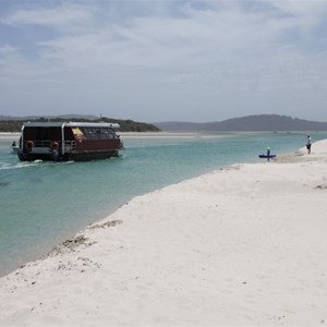 WOW cruise boat at head of inlet near ocean