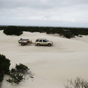 Solid sand dunes behind point