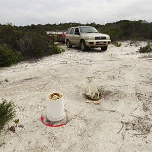 White sand and cover = well hidden well