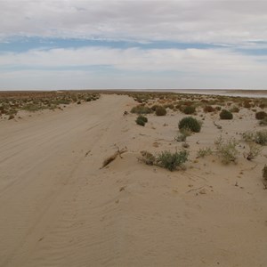 Channel on west side of track