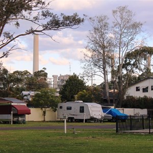 Vans with power station in the background