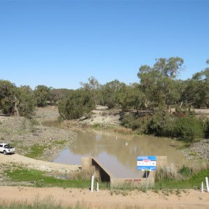 Campsite on right bank behind water