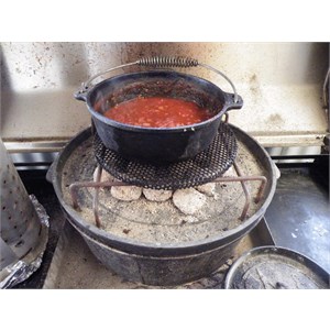 cooking sauce on top and ribs underneath